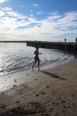 Christmas Day Plunge
At 94, Bob Humphrey was the elder statesman participating in the Christmas Day plunge held at Mattapoisett Town Beach, which including 47 swimmers and raised $2,595 in donations for the benefit of Helping Hands & Hooves. While December 25 was unseasonably mild, the water temperature in the harbor was still chilly as the effort inspired camaraderie among participating friends and couples. Photos by Mick Colageo
