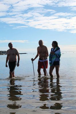 Christmas Day Plunge
At 94, Bob Humphrey was the elder statesman participating in the Christmas Day plunge held at Mattapoisett Town Beach, which including 47 swimmers and raised $2,595 in donations for the benefit of Helping Hands & Hooves. While December 25 was unseasonably mild, the water temperature in the harbor was still chilly as the effort inspired camaraderie among participating friends and couples. Photos by Mick Colageo
