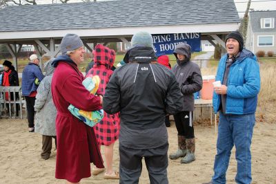 Christmas Swim
Kate Butler was last to arrive but last one out of the water after two dozen people braved the cold, raw elements of the 2021 Christmas morning swim held December 25 at Mattapoisett Town Beach. The event was held for the benefit of Helping Hands and Hooves, a program run by Julie Craig and Debbie Dyson that offers experiences, especially horseback riding, to people with cognitive challenges who have aged out of the many children's programs. Photos by Mick Colageo
