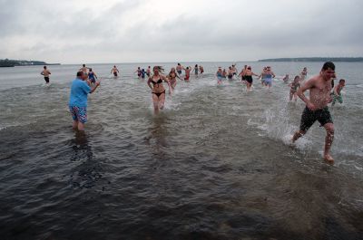 Christmas Day Swim
On Tuesday, December 25, many Tri-Town residents braved the chilly temperatures and jump into Mattapoisett Town Beach for the 12th Annual Christmas Day Swim.  All of the proceeds benefitted the Helping Hands and Hooves organization, which provides therapeutic horseback rides to people with disabilities.  Photo by Felix Perez. 
