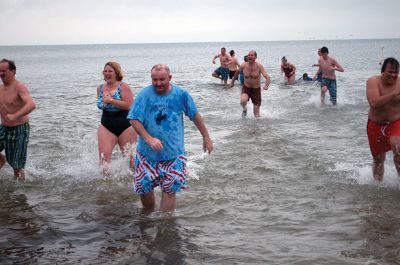 Christmas Day Swim
On Tuesday, December 25, many Tri-Town residents braved the chilly temperatures and jump into Mattapoisett Town Beach for the 12th Annual Christmas Day Swim.  All of the proceeds benefitted the Helping Hands and Hooves organization, which provides therapeutic horseback rides to people with disabilities.  Photo by Felix Perez. 
