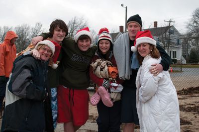 Christmas Day Swim
On Tuesday, December 25, many Tri-Town residents braved the chilly temperatures and jump into Mattapoisett Town Beach for the 12th Annual Christmas Day Swim.  All of the proceeds benefitted the Helping Hands and Hooves organization, which provides therapeutic horseback rides to people with disabilities.  Photo by Felix Perez. 
