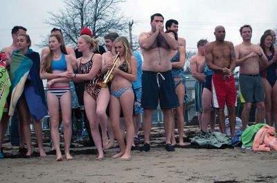 Christmas Day Swim
On Tuesday, December 25, many Tri-Town residents braved the chilly temperatures and jump into Mattapoisett Town Beach for the 12th Annual Christmas Day Swim.  All of the proceeds benefitted the Helping Hands and Hooves organization, which provides therapeutic horseback rides to people with disabilities.  Photo by Felix Perez. 
