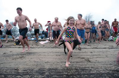Christmas Day Swim
On Tuesday, December 25, many Tri-Town residents braved the chilly temperatures and jump into Mattapoisett Town Beach for the 12th Annual Christmas Day Swim.  All of the proceeds benefitted the Helping Hands and Hooves organization, which provides therapeutic horseback rides to people with disabilities.  Photo by Felix Perez. 
