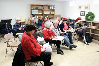 A Christmas Carol
A group of Charles Dickens enthusiasts ranging from casual to serious gathered to participate in a reading of “A Christmas Carol” Saturday morning at the Plumb Corner Library. Pictured here Stan Moszczenski  reads an excerpt. Photo by Nick Walecka  
