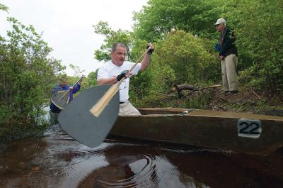 Memorial Day Boat Race
Keeping with an 80 year-old tradition, people with their home made boats raced toward the finish line during the annual Rochester Memorial Day Boat Race. Beginning at Grandma Hartley’s Reservoir on Snipatuit Road, boaters paddled the almost 12-mile race route to Herring Weir at River Road in Mattapoisett. There were 65 teams in all. Photo by Felix Perez.
