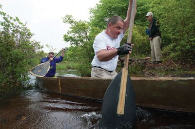 Memorial Day Boat Race
Keeping with an 80 year-old tradition, people with their home made boats raced toward the finish line during the annual Rochester Memorial Day Boat Race. Beginning at Grandma Hartley’s Reservoir on Snipatuit Road, boaters paddled the almost 12-mile race route to Herring Weir at River Road in Mattapoisett. There were 65 teams in all. Photo by Felix Perez.
