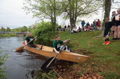 Memorial Day Boat Race
Keeping with an 80 year-old tradition, people with their home made boats raced toward the finish line during the annual Rochester Memorial Day Boat Race. Beginning at Grandma Hartley’s Reservoir on Snipatuit Road, boaters paddled the almost 12-mile race route to Herring Weir at River Road in Mattapoisett. There were 65 teams in all. Photo by Felix Perez.
