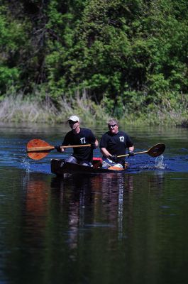 Memorial Day Boat Race
Dan Lawrence and William D. Watling III of Rochester (above left) broke the race record, winning the men’s division with a time of 1:46:59. Amy Hartley-Matteson of Mattapoisett and Katherine Hartley of Rochester (2:11:14) won the women’s division for the third consecutive time – the second time they’ve three-peated. But the day’s biggest champion was 2-year-old Chloe Harding (above right), a cancer survivor who raced with her father, Harrison. Photos by Felix Perez and Nick Walecka.
