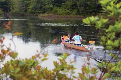 Memorial Day Boat Race
Keeping with an 80 year-old tradition, people with their home made boats raced toward the finish line during the annual Rochester Memorial Day Boat Race. Beginning at Grandma Hartley’s Reservoir on Snipatuit Road, boaters paddled the almost 12-mile race route to Herring Weir at River Road in Mattapoisett. There were 65 teams in all. Photo by Felix Perez.
