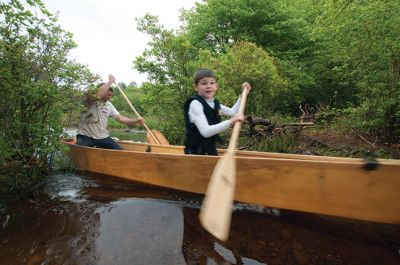 Memorial Day Boat Race
Keeping with an 80 year-old tradition, people with their home made boats raced toward the finish line during the annual Rochester Memorial Day Boat Race. Beginning at Grandma Hartley’s Reservoir on Snipatuit Road, boaters paddled the almost 12-mile race route to Herring Weir at River Road in Mattapoisett. There were 65 teams in all. Photo by Felix Perez.
