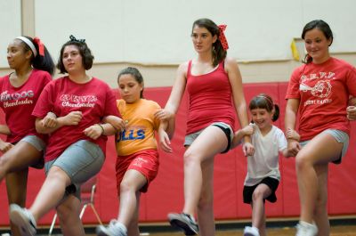 Catch the spirit! 
It was some tween fun at Old Rochester Regional High School on Sunday, September 5, 2010 when the schools varsity cheerleaders provided a cheer clinic fundraiser for young, aspiring cheerleaders. These younger cheerleaders will join the varsity squad at the ORR/Nauset football game on September 11, at the ORR David Hagen field at 7:00 pm. For more sports and ORR information, read the articles in this weeks issue from ORR students Anne Smith and Ben Resendes. Photos by Felix Perez.
