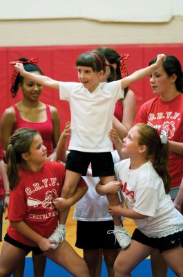 Bulldog Spirit!
Catch the spirit! It was some tween fun at Old Rochester Regional High School on Sunday, September 5, 2010 when the schools varsity cheerleaders provided a cheer clinic fundraiser for young, aspiring cheerleaders. These younger cheerleaders will join the varsity squad at the ORR/Nauset football game on September 11, at the ORR David Hagen field at 7:00 pm. For more sports and ORR information, read the articles in this weeks issue from ORR students Anne Smith and Ben Resendes. Photos by Felix Perez.
