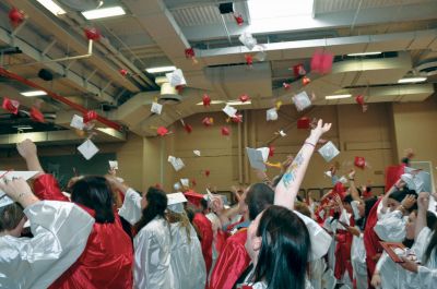 Class of 2010
Old Rochester Regional High School graduates from the Class of 2010 toss their caps up in the air and celebrate a bright future on June 5, 2010. Photo by Tim Smith.
