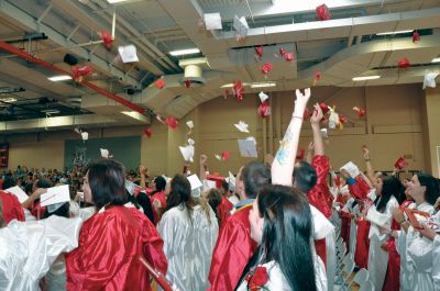 Class of 2010
Old Rochester Regional High School graduates from the Class of 2010 toss their caps up in the air and celebrate a bright future on June 5, 2010. Photo by Tim Smith.
