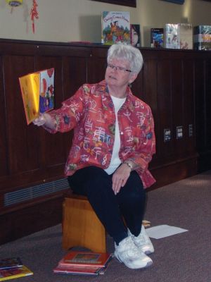 Learning About China
Children learned about Chinese culture and the Year of the Rabbit at a February 24, 2011 Mattapoisett library event. Librarian Linda Burke read a traditional Chinese story, and then the children enjoyed making their own dragons, watched as Haiying Zhang wrote their names in Mandarin, and tried eating fried rice with chopsticks. Photo by Anne Kakley. March 3, 2011 edition
