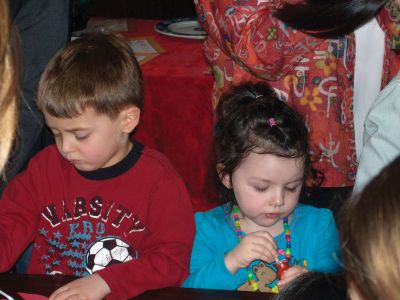 Chinese Culture
Children learned about Chinese culture and the Year of the Rabbit at a February 24, 2011 Mattapoisett library event. Librarian Linda Burke read a traditional Chinese story, and then the children enjoyed making their own dragons, watched as Haiying Zhang wrote their names in Mandarin, and tried eating fried rice with chopsticks. Photo by Anne Kakley.
