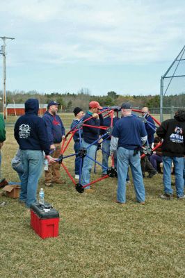 Volunteering in Rochester
An Army of volunteers descended on the Dexter Lane Sports Complex on Saturday, March 28 to build a much-anticipated playground for the town of Rochester. The project is the result of a community wide fundraising effort spearheaded by Craig Davignon's 4th grade class at Rochester Memorial School over the last several years. (Photo by Robert Chiarito) April 2, 2009 edition
