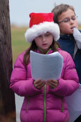 Holiday Caroling 
On Saturday, December 1, several Mattapoisett residents gathered together to go Christmas Caroling throughout the village. The carolers met at the Mattapoisett Library and made their way around town, stopping at the Inn at Shipyard Park for refreshments.  Photos by Feliz Perez. 
