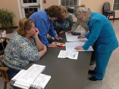 Rochester Annual Election
Town Clerk Naida Parker (right) tallys the votes at last wek’s Rochester election. The final count decided the Selectmanss race with a differnce of only 26 votes. Photo by Shawn Badgley
