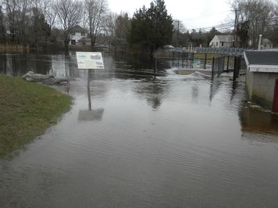 River Road Flood
The heavy rains over the past week finally pushed the Mattapoisett River beyond it's banks causing the road to be closed and flooding near by yards. March 31, 2010.  Photo by Paul Lopes
