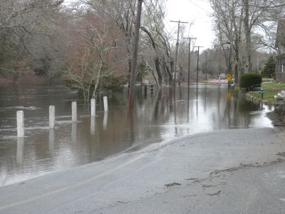 River Road Flood
The heavy rains over the past week finally pushed the Mattapoisett River beyond it's banks causing the road to be closed and flooding near by yards. March 31, 2010.  Photo by Paul Lopes
