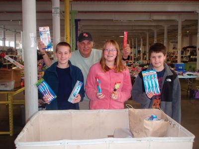 Gifts To Give
Junior Friends of the Mattapoisett Library collected over 1200 dental supplies during the month of February from Center School, Old Hammondtown School, the Junior and Senior High Schools, and local dentists for "Gifts to Give" in New Bedford. Pictured from left to right: Michael Kassabian, Jim Stevens CEO and Founder of Gifts to Give, Aimee Hill, and Daniel Fealy. Photo by Lisa Hill.
