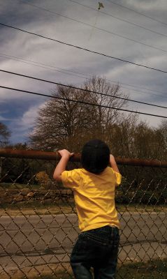 Flying High
Two-year-old Brady Araujo watches a kite flying on a Mattapoisett beach on April 29, 2011. Photo courtesy of Sheila Araujo.
