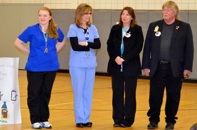 Rochester Lions Club
The school gave a “giant thank you” to the Rochester Lions Club for the donation of a brand new vision screener to replace the one the Lions Club donated to the school 44 years ago (below, right). School Nurse Michelle Humphrey showed her gratitude by asking students at Old Colony to create a small plaque thanking the Lions Club to be affixed to the side of the vision screener. The vision screener cost just under $2,000, and Rochester Lions Club Members John Cobb and Deb Marten attended 
