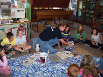 Marion Natural History
An instructor showed children how to determine a soil profile at a recent event at the Marion Natural History Museum. Photo courtesy of Elizabeth Leidhold.
