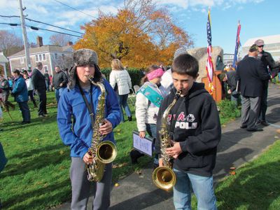 Veteran's Day 2013
The Tri-Town honored veterans on Monday with moving programs. In Marion, the parade included Cub Scout Pack 32, Master of Ceremonies Joe Napoli, and the Sippican School Band. In Mattpoisett, Daniel Mazzuca gave a speech that focused on what our country can do for veterans in need of jobs, housing, and mental health services. The Old Hammondtown School band and chorus provided strong performances. Photos by Joan Hartnet-Barry & Shawn Badgley.
