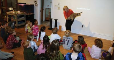 Marion Natural History Museum
The Marion Natural History Museum’s afterschool group enjoyed a wonderful program about sea turtles of Buzzards Bay last Wednesday. During the program the students had a chance to view videos of hatchling turtles, learn a little about sea turtle biology, and handle some live terrapins. We wish to thank Don Lewis and Sue Weber Nourse for providing this exciting program. Photos courtesy Turtle Journal.
