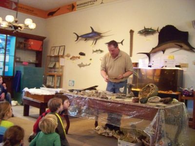 Collecting Fossils
Jim Pierson spoke about his experiences collecting fossils during an afterschool program at the Marion Natural History Museum in early February 2011. Photo courtesy of Elizabeth Liedhold.
