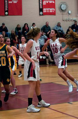 ORR Basketball
The ORR Lady Bulldogs Varsity Basketball team dominated Dighton-Rehoboth 50-24 Thursday night in front of a home crowd in the ORR gymnasium.  The girls went on a 16-2 run in the first quarter and never gave up their lead.  The team improves to 4-1 overall and 3-0 in the South Coast Conference. Sophomore Gabby Reuter and Junior Haley Dickerson each had 14 points and 10 rebounds apiece. Photo by Felix Perez
