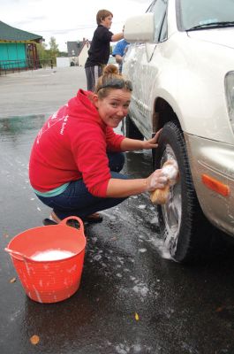 ORR Sail Car Wash
Members of the Old Rochester Regional High School Sailing Club soaped, scrubbed and washed cars on Sunday, October 3, 2010 at the Mattapoisett Fire Station. All proceeds of the fundraiser supported the Sailing Club at ORRHS. Photos by Felix Perez.
