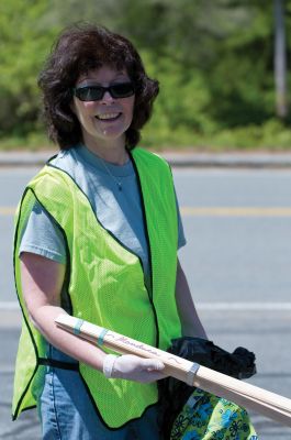 Marion Clean-up
Marion residents hit the street to pick up trash around town on Saturday, May 15. All over Marion, there were people in day-glo vests working with Manducas, long pincers made by Marion resident Eunice Manduca for picking up trash. The collected trash was placed in front of the Marion Music Hall to create Trash Bag Mountain. Photos by Felix Perez.
