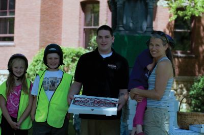 Marion Clean-up
Marion residents hit the street to pick up trash around town on Saturday, May 15. All over Marion, there were people in day-glo vests working with Manducas, long pincers made by Marion resident Eunice Manduca for picking up trash. The collected trash was placed in front of the Marion Music Hall to create Trash Bag Mountain. Photos by Felix Perez.
