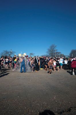 2015 Freezin’ for a Reason Polar Plunge
The 2015 Freezin’ for a Reason Polar Plunge on New Year’s Day at Town Beach in Mattapoisett was a splashing success, according to event coordinator Michelle Huggins. The third annual polar plunge raised nearly $10,000 to provide financial assistance to local families battling cancer. Many participants donned costumes, competing for the best costume trophy.  Photo by Felix Perez
