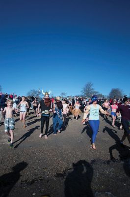 2015 Freezin’ for a Reason Polar Plunge
The 2015 Freezin’ for a Reason Polar Plunge on New Year’s Day at Town Beach in Mattapoisett was a splashing success, according to event coordinator Michelle Huggins. The third annual polar plunge raised nearly $10,000 to provide financial assistance to local families battling cancer. Many participants donned costumes, competing for the best costume trophy.  Photo by Felix Perez
