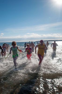 2015 Freezin’ for a Reason Polar Plunge
The 2015 Freezin’ for a Reason Polar Plunge on New Year’s Day at Town Beach in Mattapoisett was a splashing success, according to event coordinator Michelle Huggins. The third annual polar plunge raised nearly $10,000 to provide financial assistance to local families battling cancer. Many participants donned costumes, competing for the best costume trophy.  Photo by Felix Perez
