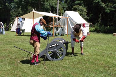 Heritage Days
Revolutionary re-enactors Frank Matthew and Chuck Crowmwell loaded a cannon that was next to the Mattapoisett River on Friday and Saturday as Colonial American re-enactors camped out next to the river as part of Mattapoisett's Heritage Days Celebration, which took place on August 7 and 8. Photo by Adam Silva
