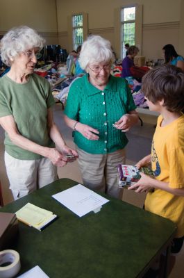 Rummage Sale!
There were lots of little treasures to choose from when the Mattapoisett Congregational Church held their annual rummage sale on Saturday, May 15, 2010. Items for sale included clothing, books and decorative items. Photo by Felix Perez.
