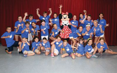 Showstoppers at Disney
The Showstoppers – the Tri-Town’s community-service singing troupe – performed at the Waterside Stage in Downtown Disney World to a packed crowd and standing ovation on Aug. 8. The members, who range in age from 6 to 19, also participated in a Disney Performing Arts Workshop. Photo courtesy Kelly Zucco.
