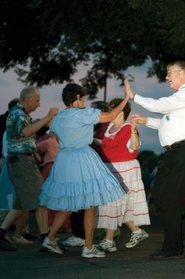 Square Dancing
It was good, ol fashioned, square-dancin fun at the Mattapoisett gazebo on July 10, 2010. As the sun set over Mattapoisett harbor, the Wareham Swingers dance group held a free, all-ages square dancing session. Photo by Felix Perez.
