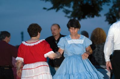 Square Dancing
It was good, ol fashioned, square-dancin fun at the Mattapoisett gazebo on July 10, 2010. As the sun set over Mattapoisett harbor, the Wareham Swingers dance group held a free, all-ages square dancing session. Photo by Felix Perez.
