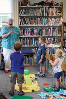 Story time
Everything was beachy-keen at the Plumb Corner library in Rochester when youngsters enjoyed a beach-themed storytime with retired kindergarten teacher Ms. Demers on July 16, 2010. A Teddy Bear themed storytime is scheduled for July 30 at 10:30 am in the Plumb Corner library  dont miss it! Photo by Anne OBrien-Kakley.
