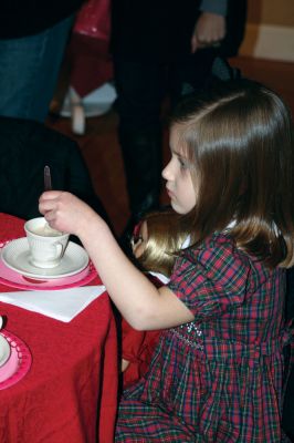 Valentine Tea
The Marion Art Center hosted an American Girl themed Valentine Tea Party on February 6, 2010. Over 20 girls dressed in their pink and red finest enjoyed dainty finger foods, festive cupcakes, red fruit punch, and tea. Morgan Middleton played Kirsten and Phoebe Mock played Singing Bird in the Marion Art Center American Girl mini-musical that accompanied the tea party. Photo by Anne OBrien-Kakley.
