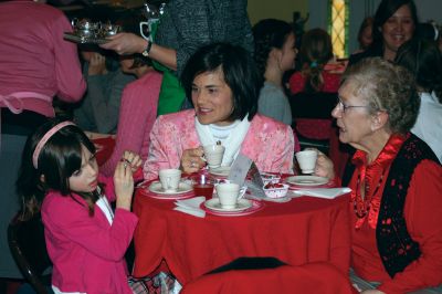 Valentine Tea
The Marion Art Center hosted an American Girl themed Valentine Tea Party on February 6, 2010. Over 20 girls dressed in their pink and red finest enjoyed dainty finger foods, festive cupcakes, red fruit punch, and tea. Morgan Middleton played Kirsten and Phoebe Mock played Singing Bird in the Marion Art Center American Girl mini-musical that accompanied the tea party. Photo by Anne OBrien-Kakley.
