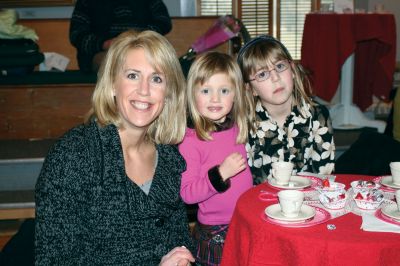 Valentine Tea
The Marion Art Center hosted an American Girl themed Valentine Tea Party on February 6, 2010. Over 20 girls dressed in their pink and red finest enjoyed dainty finger foods, festive cupcakes, red fruit punch, and tea. Morgan Middleton played Kirsten and Phoebe Mock played Singing Bird in the Marion Art Center American Girl mini-musical that accompanied the tea party. Photo by Anne OBrien-Kakley.
