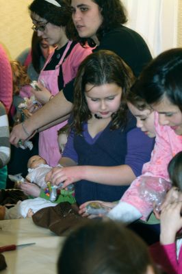 Valentine Tea
The Marion Art Center hosted an American Girl themed Valentine Tea Party on February 6, 2010. Over 20 girls dressed in their pink and red finest enjoyed dainty finger foods, festive cupcakes, red fruit punch, and tea. Morgan Middleton played Kirsten and Phoebe Mock played Singing Bird in the Marion Art Center American Girl mini-musical that accompanied the tea party. Photo by Anne OBrien-Kakley.
